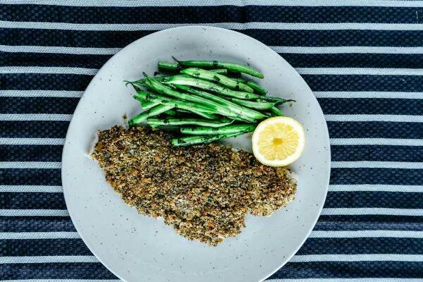 Crunchy crumbed plaice fillet with buttered green beans