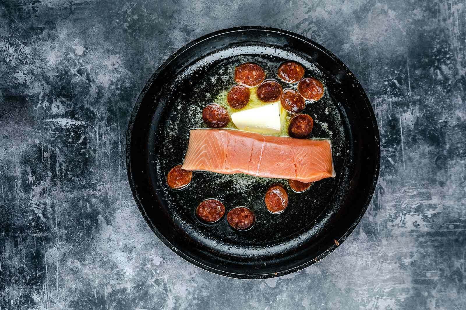 Salmon fillets with egg and chips