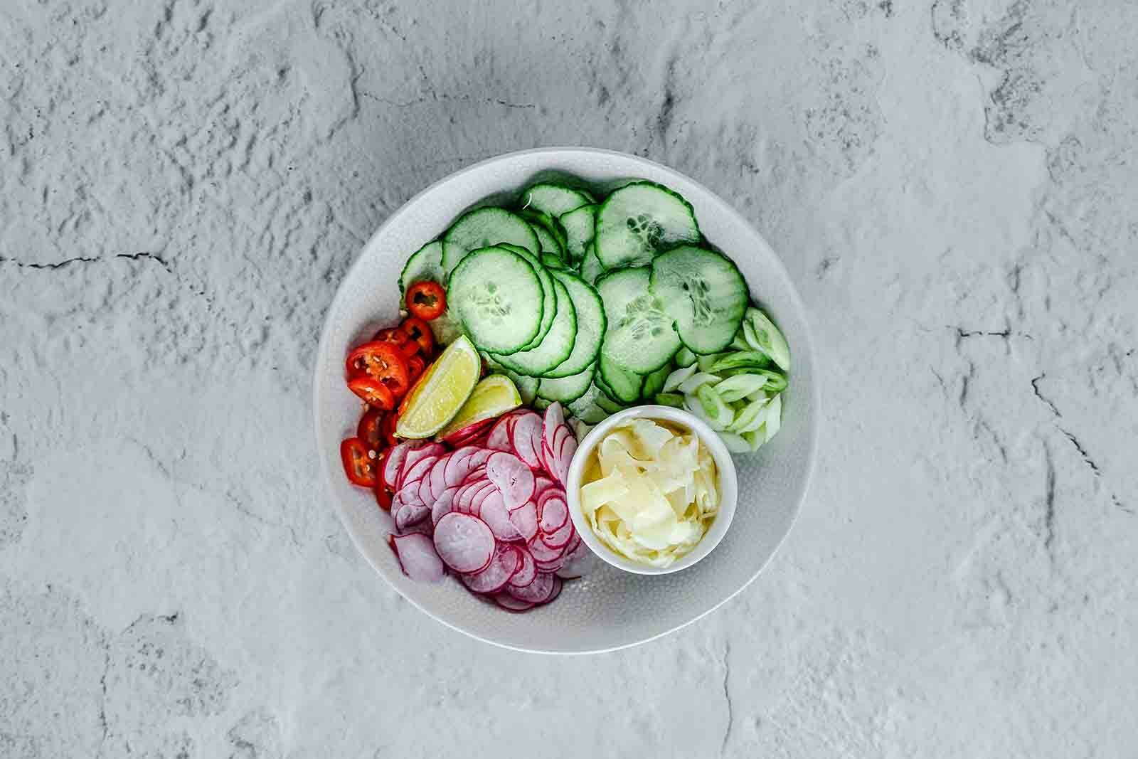 Tempura prawns with radish, ginger and cucumber salad