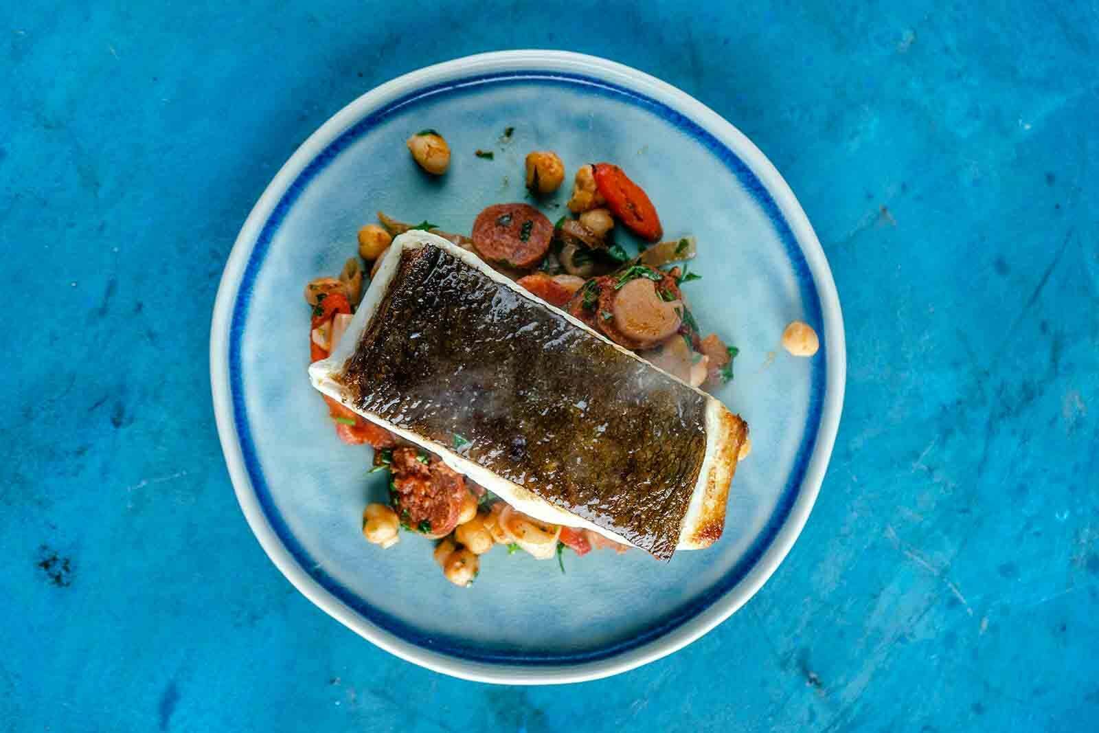 Wild Halibut fillet with chickpeas, peppers and chorizo