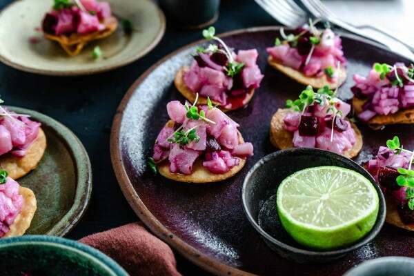 Sea bass ceviche with beetroot canapes