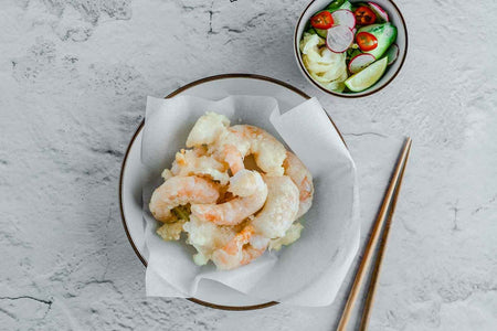 Tempura prawns with radish, ginger and cucumber salad