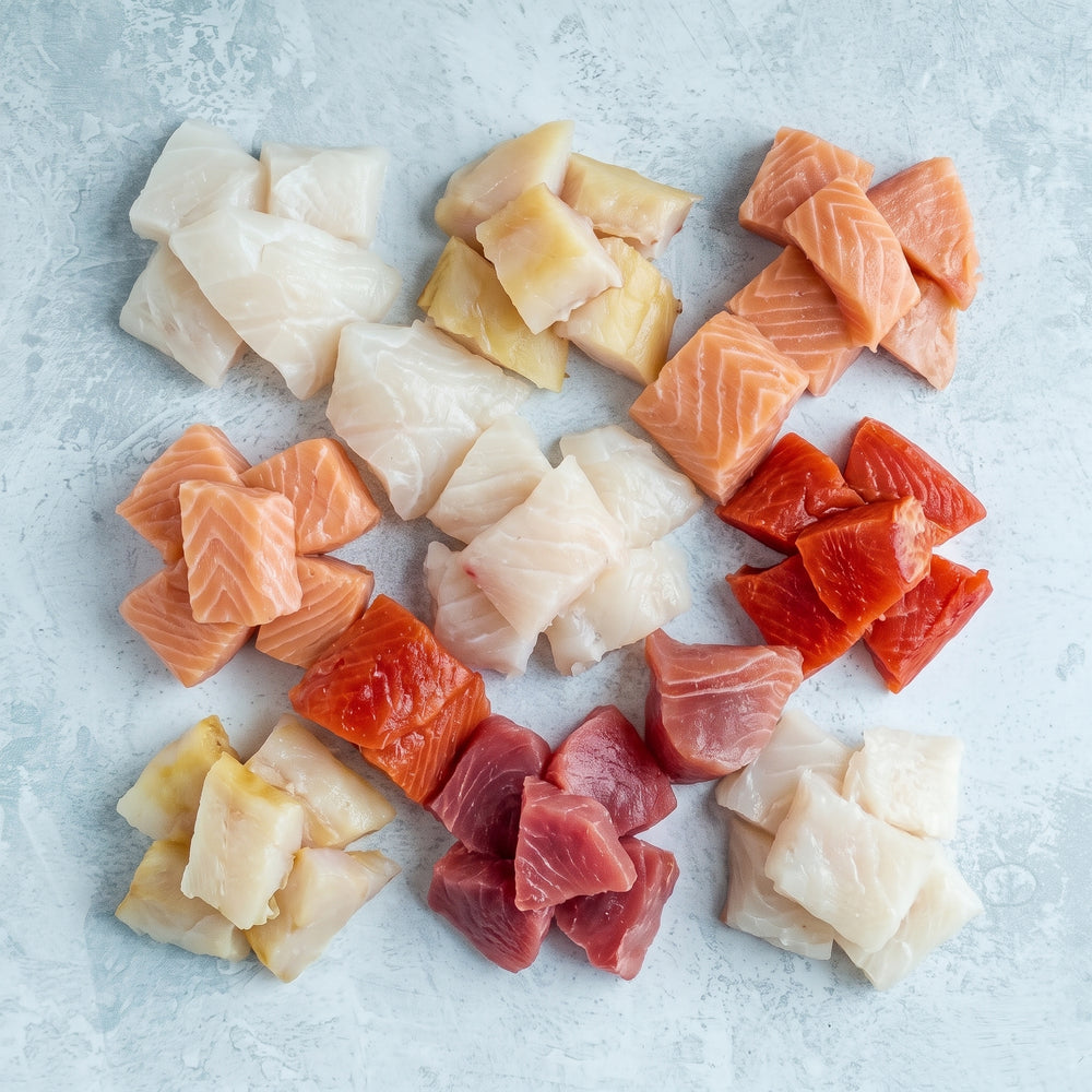 Mixed fish misshapes Freezer Filler: ten vacuum packs of cod, smoked haddock, Atlantic salmon, wild sockeye and yellowfin tuna offcuts