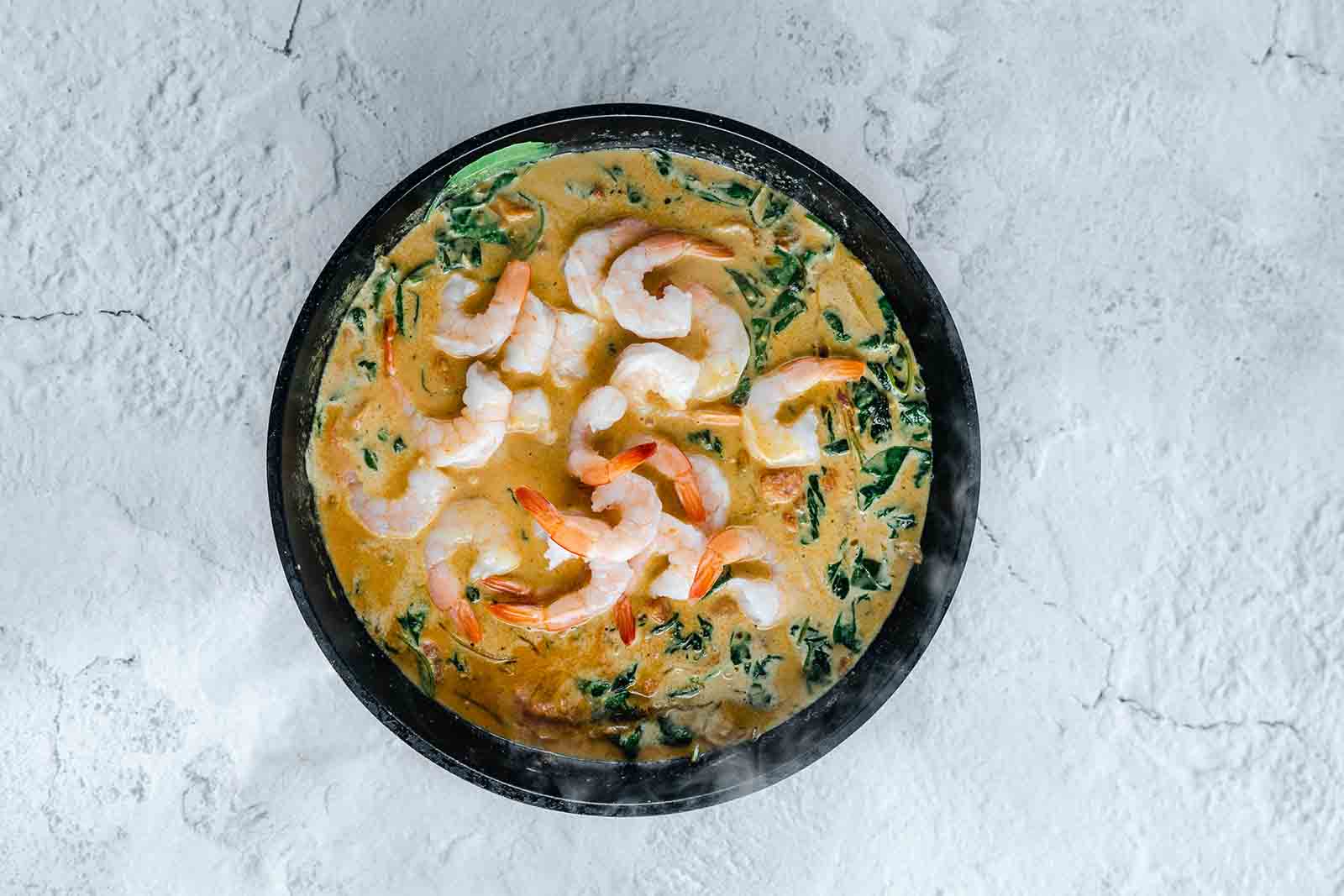 Prawn and coconut curry with spinach