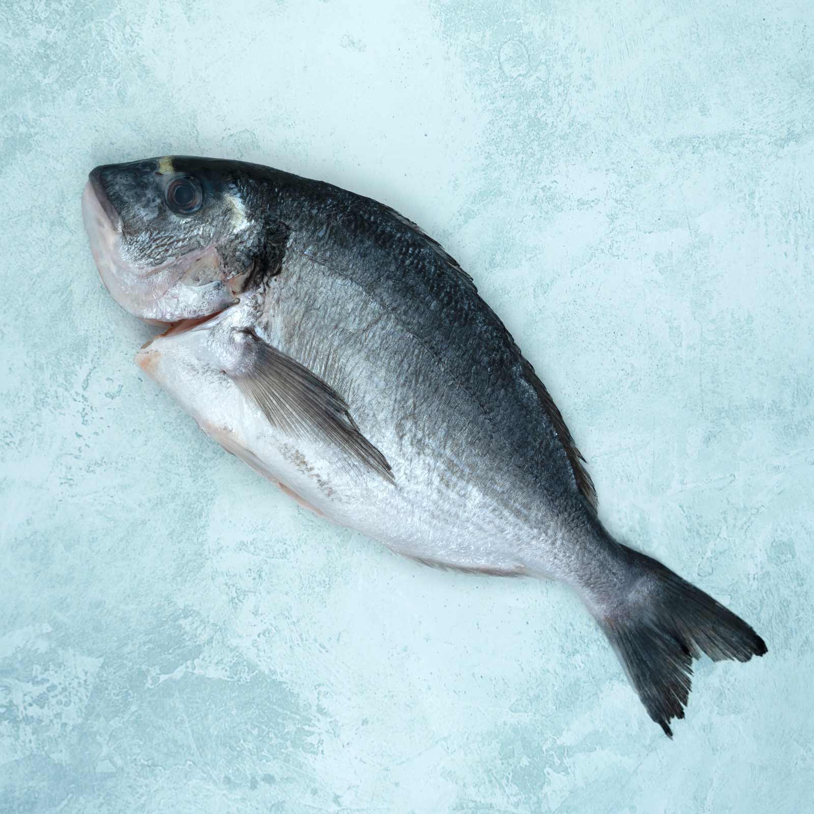 Sea Bre Oven Baked Tandoori Style Sea Bream & Roasted Potatoes Mixed with ...